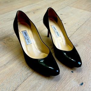 Black patent leather Jimmy Choos. Inch heel and in good condition.